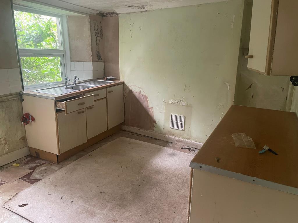 Lot: 6 - HOUSE FOR IMPROVEMENT - Former kitchen with sink and further unit